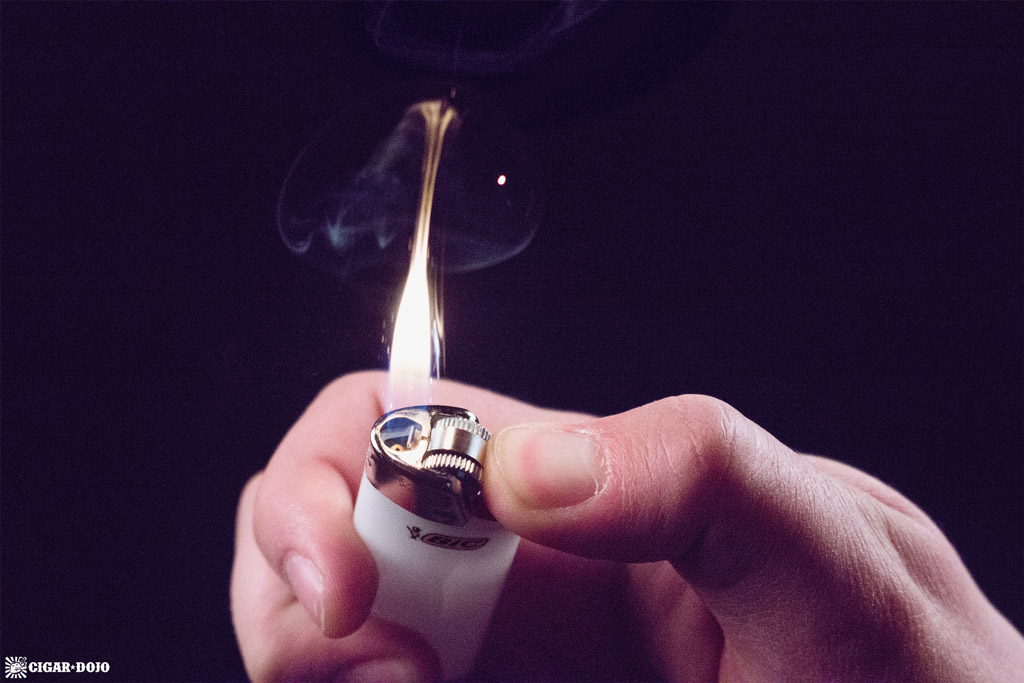 Cigar lighting using disposable Bic lighter